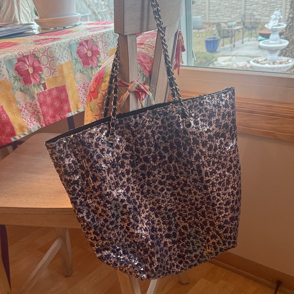 City, struts, black and silver sequin purse